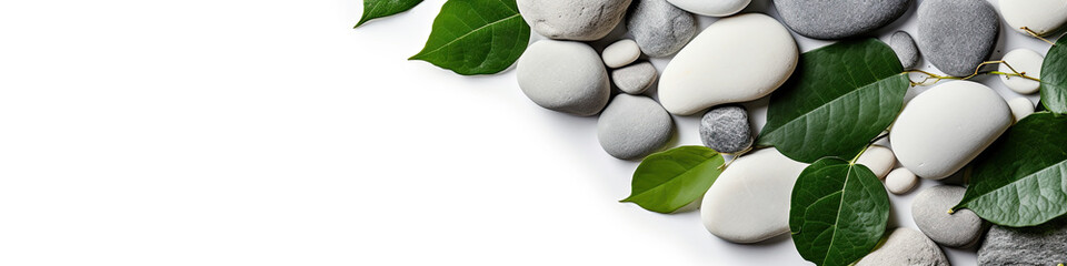 Spa stones and leaves on grey background