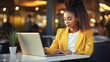© BlazingDesigns - Young african american university student study online on laptop pc.