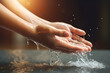 Human hands washing in water. Morning washing ritual. Religious cleansing with dramatic lighting and earthy tones