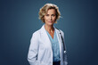 © Kalim - Ai generated image of mature senior doctor on blue background
