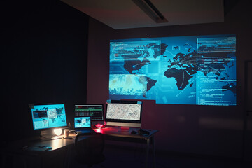 Fototapete - Dark, empty office and computer for global research or monitor of a system. Closeup, technology abstract and a pc at night at company for programming, cloud computing or data science for the world