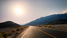 Sunrise On The Road In Death Valley National Park In California. Hot Dry Desert Climate In Summer.