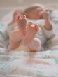 Newborn feet closeup view
