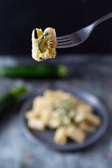 Wall Mural - Macaroni pasta with zucchini and ricotta cheese. Perfect for vegetarian and healthy diet.