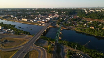 Sticker - Aerial of the traffic on the road and the interchange with buildings in the background