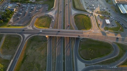 Sticker - Aerial of the traffic on the road and the interchange with buildings in the background