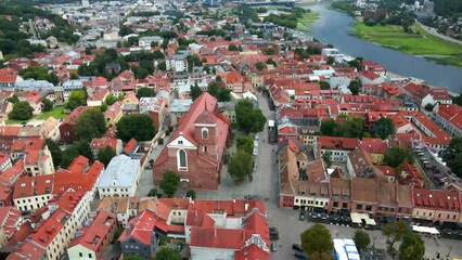 Canvas Print - Drone shot over Kaunas town hall with a town view and red houses