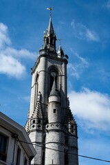 Sticker - the tower of the church has a clock on it's steeples