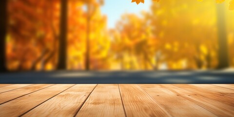 Wall Mural - Wooden planks against the background blurred of trees in a beautiful autumn park. Autumn background for presentation