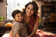© StockImageFactory - Indian young mother and little kid cuddling at home