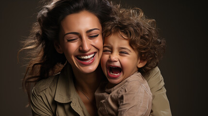 Indian young mother and little kid cuddling at home