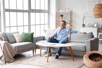 Poster - Mature man resting on his day off at home