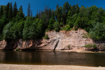 Poster - Sandstone Kuku cliffs by the river Gauja, Latvia.