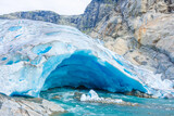 Fototapeta Tęcza - The Nigardsbreen Glacier, beautiful blue melting glacier in the Jostedalen National Park,  Norway