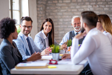 Wall Mural - Corporate business team and manager in a meeting