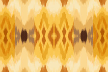 Ikat Pattern In Light Brown And Yellow Ethnic Pattern Colorful Background. Traditional Folk Antique Ornate Elegant Luxury. Print Design For Fabric Texture Textile Wallpaper Background Backdrop.