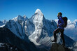 © Andrii Vergeles - Man on peak of mountain. Mountain peak Ama Dablam. National Park, Nepal.