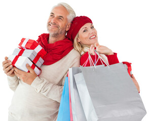 Digital png photo of caucasian couple with bags and presents on transparent background