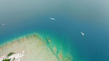 Wall Mural - aerial view of the coast on lake garda near sirmione