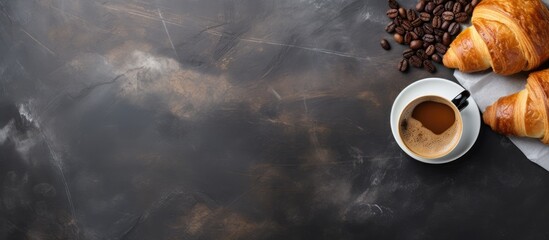 Poster - Fresh croissants and coffee placed on a stone table as seen from above, with empty space for adding