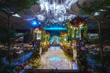 Fototapeta  - beautiful luxury wedding event colourful flower flora decoration concept and romantic lighting sculpture for outdoor garden rom solemnisation and hotel fine dining