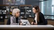 © ckybe - Woman consulting with a female financial manager at the bank