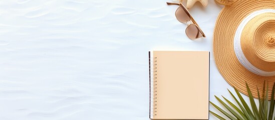Poster - A blank writing book with summer beach accessories in the background, offering plenty of space