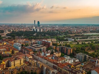 Cityscape sunset Milan Italy aerial view