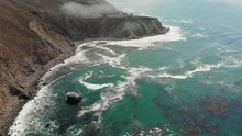 Drone Flying Over Ocean At Highway 1 View On Cliffs
