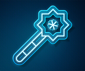 Wall Mural - Glowing neon line Magic wand icon isolated on blue background. Star shape magic accessory. Magical power. Vector