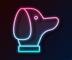 Wall Mural - Glowing neon line Dog icon isolated on black background. Vector