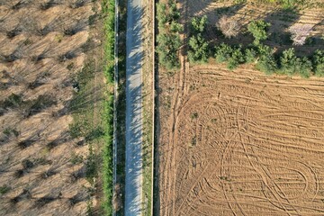 Sticker - Aerial view of a stunning field with long lines of freshly turned soil