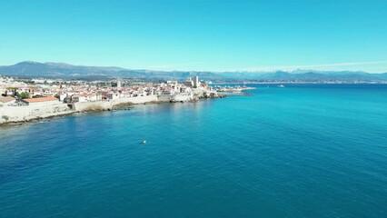 Sticker - Aerial of the white buildings of Brindisi city in Italy alongside the blue sea