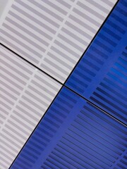 Wall Mural - Close-up of two blue-painted wall panels adjacent to each other with white and blue vertical stripes