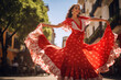 © vejaa - Beautiful female flamenco dancer in traditional dance dress. Young woman dancing flamenco on oldtown square. Flamenco is traditional Seville dance in Spain
