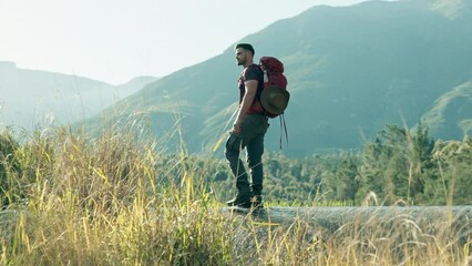 Canvas Print - Walking, water or man hiking in nature to explore outdoors for camping on holiday vacation or adventure. Traveller, trekking or hiker with backpack for travel, break or journey by mountains to relax