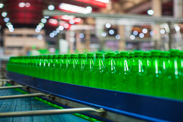 Wall Mural - Beverage factory interior. Conveyor flowing with bottles for water