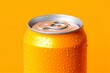 Can of fresh soda with water drops on orange background, closeup. 