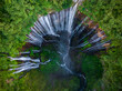 © lkunl - Aerial top view from above of Tumpak Sewu ,also known as Coban Sewu, 120m high waterfall in Malang regency, East Java, Indonesia