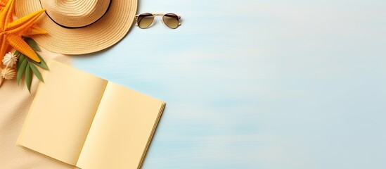 Poster - A writing book with summer beach accessories on the background is shown in a flat lay style. copy space available for writing or adding any text.
