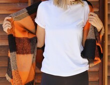 Women Wearing Blank White Tshirt With Copy Space For Your Text Or Design. White T-shirt Mock Up With Orange - Black Shawl