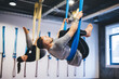 © Photocreo Bednarek - People practicing aerial yoga workout