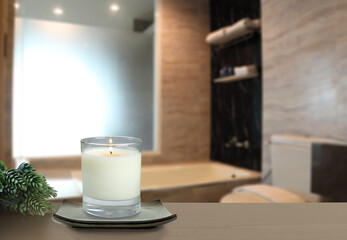 Wall Mural - The luxury lighting aromatic scent glass candle display in the luxury marble design toilet bathroom to creat relax and good scent cozy ambient on holiday in hotel resort and spa in Thailand