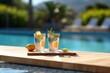 Mix of cocktails by the pool. Vacation and holiday resort concept with refreshment drinks
