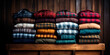 Stack of flannel shirts on a wooden shelf, Fall wardrobe, Rustic fashion
