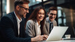 © borisk.photos - Cheerful Business Colleagues Watching a Presentation on a Laptop