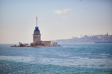 Wall Mural - view to Maiden's tower in Uskudar distric on Asian side of the city across the Bosphorus strait in Istanbul, Turkey