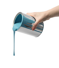 Wall Mural - Woman pouring light blue paint from can on white background, closeup