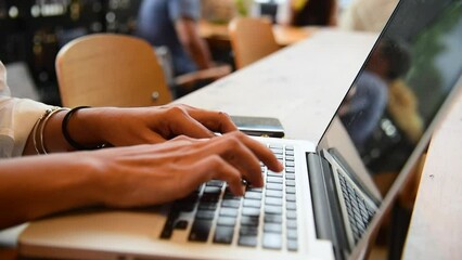 Woman typing laptop computer online meeting at home office work from home. Asian business woman using notebook laptop lifestyle. Happy programmer woman typing keyboard laptop read online website