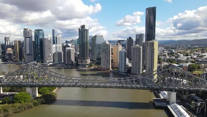 Sticker - Aerial drone view rising up over Story Bridge in Brisbane City, QLD, Australia looking toward the east facing side of the city along Brisbane River in August 2023    